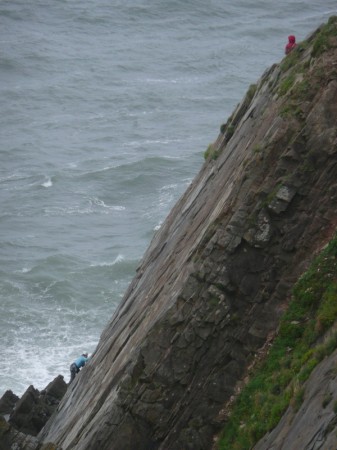 Climbing on The Promontory in some windy conditions.