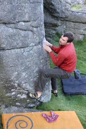 Matt eyeing up the next hold at Hound Tor.