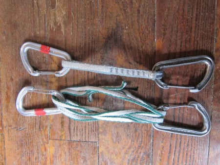 Medium length trad climbing quikdraws, 16cm sewn sling, and a 60cm extendable sling, tripled.