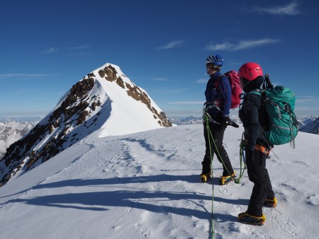 Looking across the snow arete to the main summit