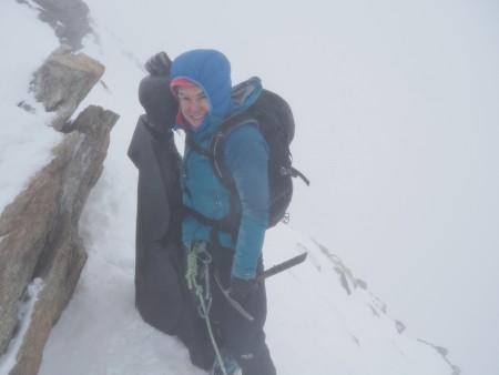 A little hug for the Madonna just below the summit on the Matterhorn.