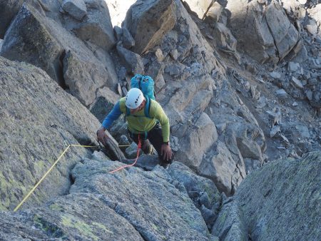 Pat pulling over in to the less steep groove after the crux 5b corner