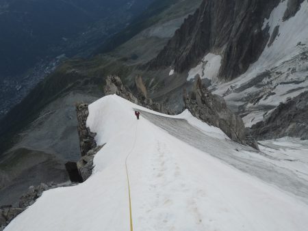 The lower snow arete on the Frendo Spur. It was super warm even at first light. We ran the rope out and used some snow anchors to get to the ice.